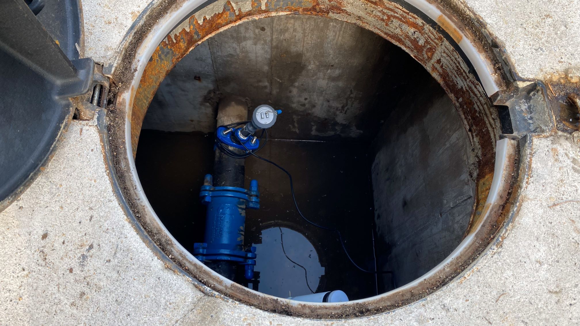 Water infrastructure inspection point relevant to biofilm compliance monitoring